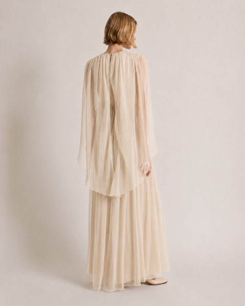 Long chiffon dress with V-neckline and cape