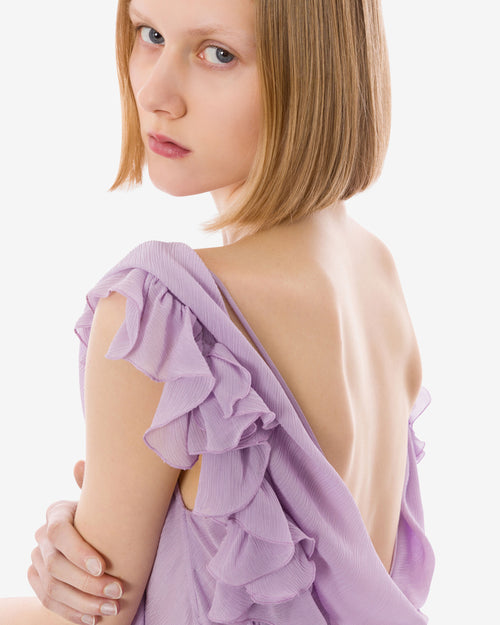 Ruffled dress with open back.