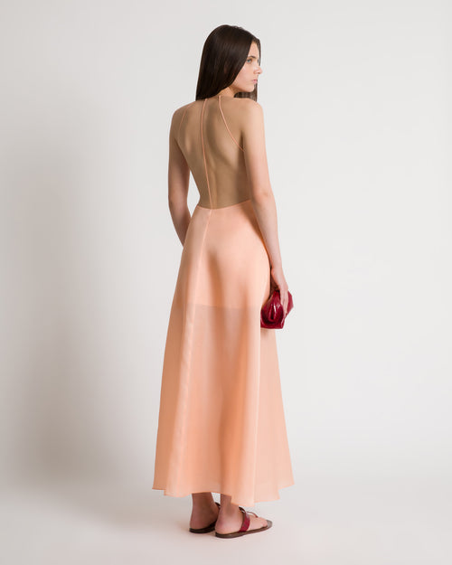 Abito con schiena scoperta in seta