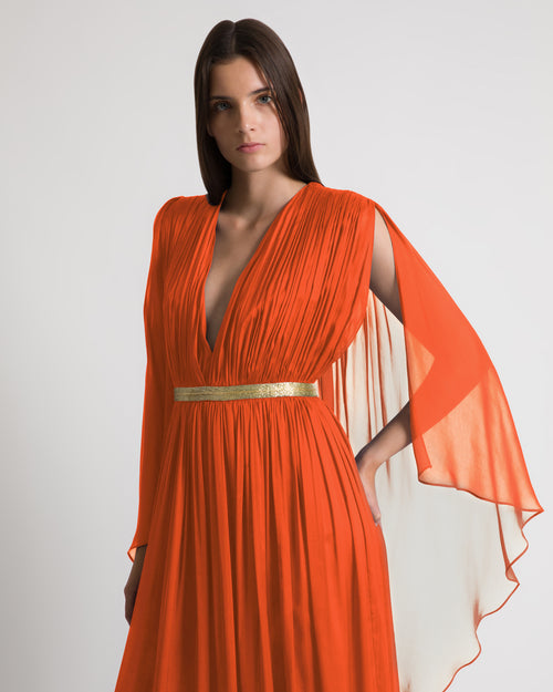 Long silk gown with shoulder-revealing cape