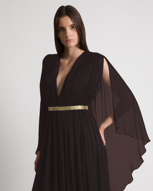 Long silk gown with shoulder-revealing cape