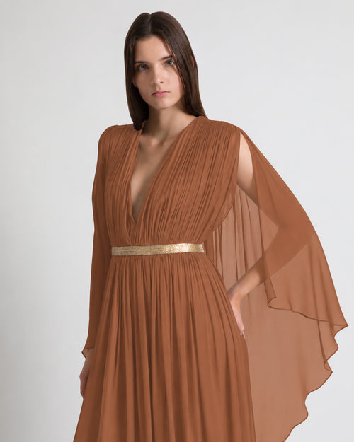 Long silk gown with shoulder-revealing cape