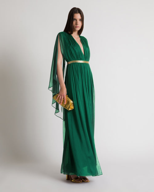 Long silk gown with shoulder-revealing cape