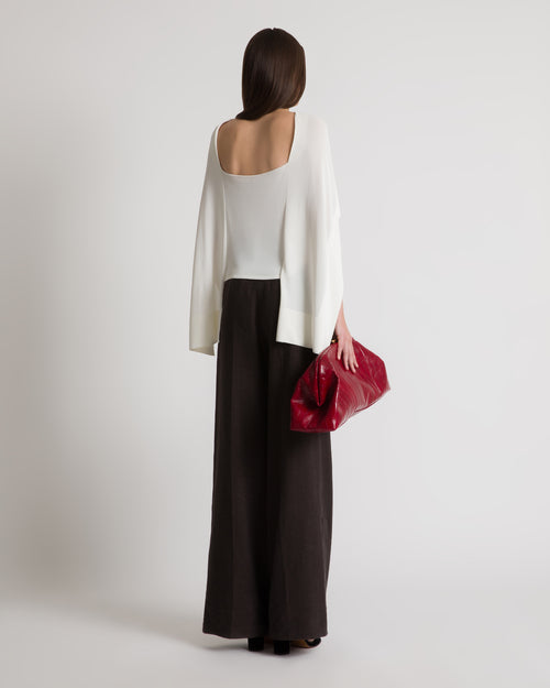 Knitted top with cape sleeves