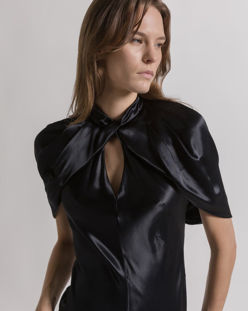 Satin evening dress with cape sleeves