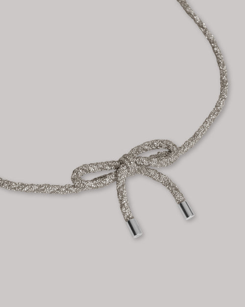 Belt with rhinestone bow