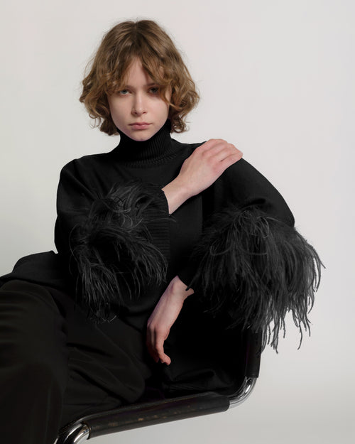Pull en laine mérinos extrafine avec plumes 