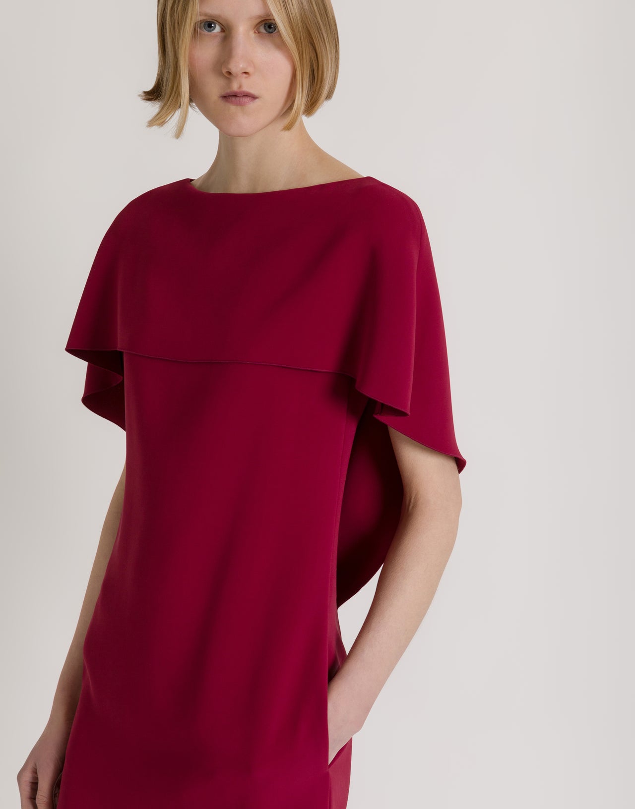 Short cape-detail dress