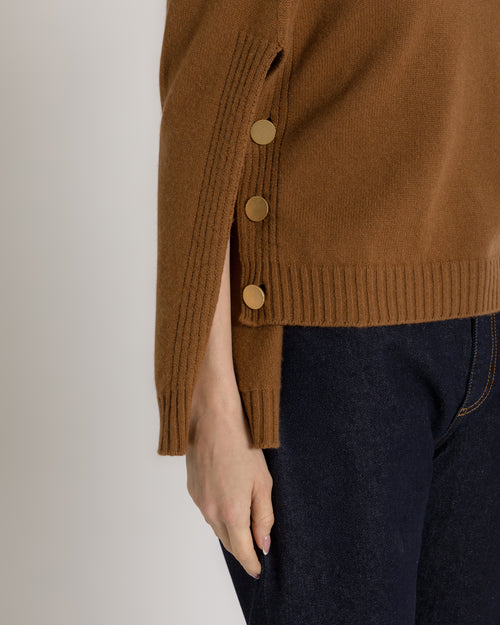 Crewneck sweater with cape sleeves and gold buttons