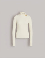 Wool, silk, and cashmere turtleneck sweater with brooch