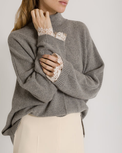 Cashmere sweater with contrasting lace cuffs