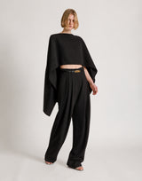 High-low fluid asymmetric cape