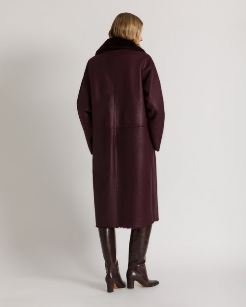Long reversible bicolor shearling coat